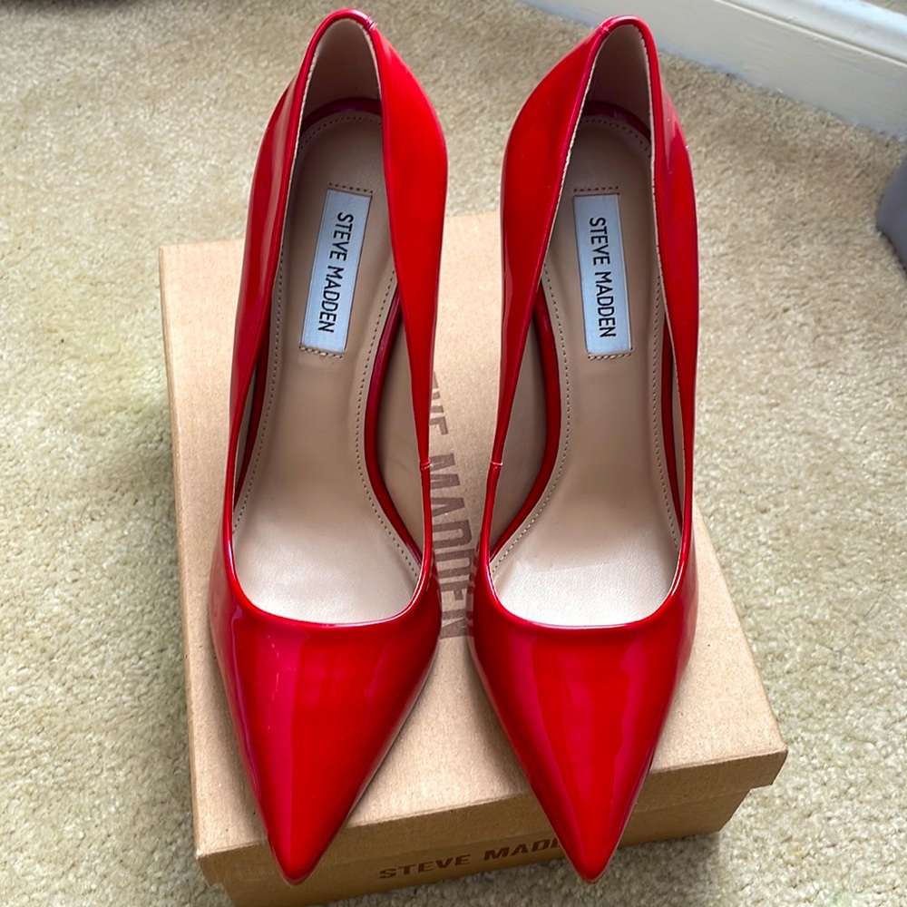Red patent Steve Madden VALA pumps.